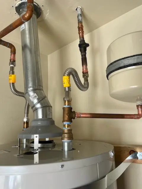Water heater installation and plumbing repair in Spanker